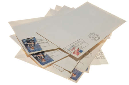A stack of authentic letters postmarked June 22, 1976 Ashbury Park, NJ (New Jersey) 07712 isolated on a white background with a clipping path and room for copy on the letter.の写真素材