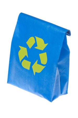 Bright blue reusable lunch bag with a bright green recycle symbol painted on it. 