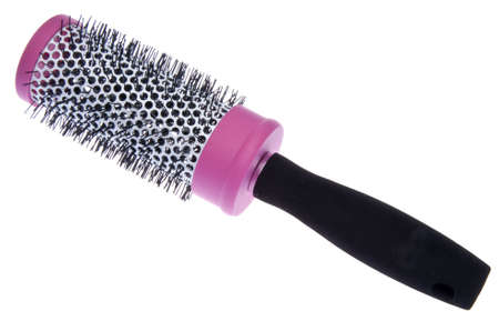 Pink and black round styling brush isolated on white with a clipping path.の写真素材
