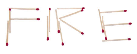 The word FIRE spelled out with red tipped matches.  Isolated on white with a clipping path.の写真素材