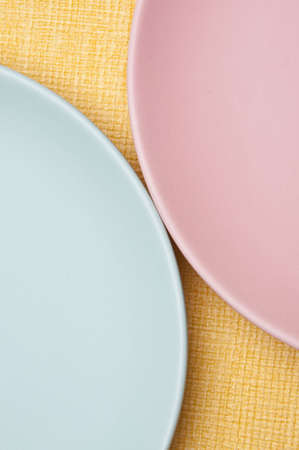 Abstract background image of pastel plates on a yellow background.の写真素材