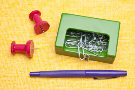 Collection of colorful office supplies for the modern cubicle.