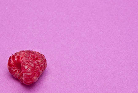  on a vibrant purple colored backgroundの写真素材