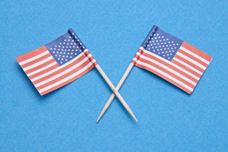 American Flag toothpicks on a blue background.  Great Patriotic July 4th Image.の写真素材