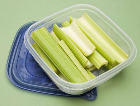 Leftover Celery in a Plastic Container with Condensation.の写真素材