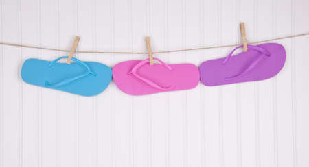 Flip Flops on a Clothesline Summertime Concept.の写真素材