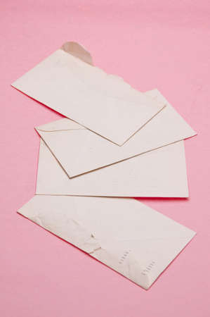 Stack of Vintage Letters on Pink.  Memory and Nostalgia Concept.の写真素材