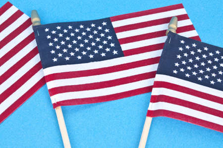 American Flag Background with Several Flags on a Blue Background.の写真素材