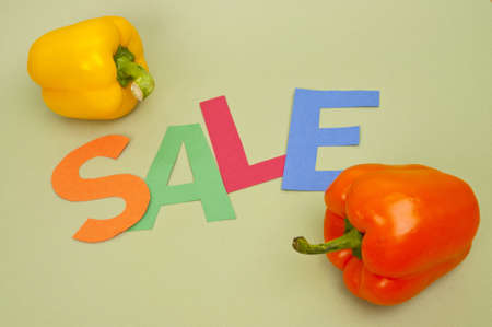 Vibrant Image for Your Next SALE featuring the word SALE and Fresh Peppers.の写真素材