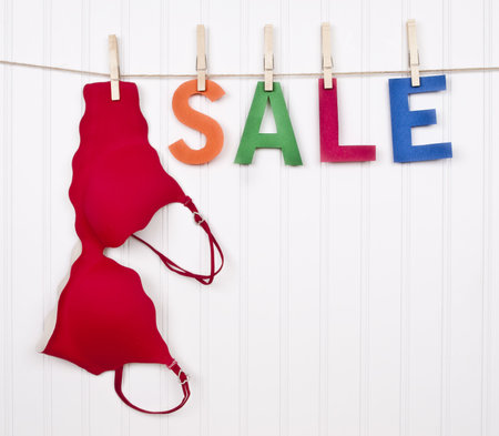 Vibrant Image for Your Next SALE featuring the word SALE and a Red Bra.の写真素材