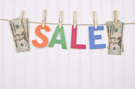 Vibrant Image for Your Next SALE featuring the word SALEand American Currency.の写真素材