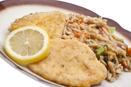 Lemon Chicken Dinner Close-up on a Plate.の写真素材