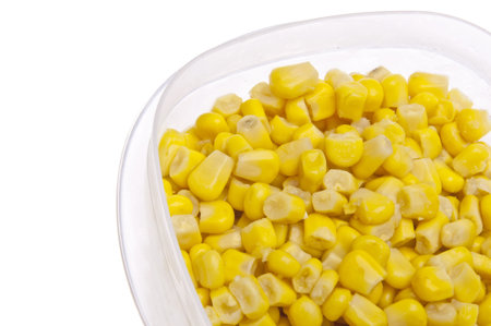 Leftover Corn in a Plastic Container Border Image Isolated on White.