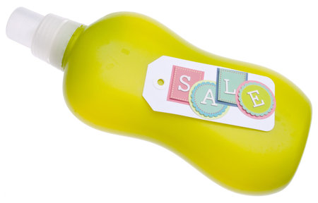 Household Cleaning Bottle with Sale Sign Isolated on White with a Clipping Path.