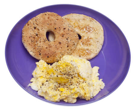 Scrambled Eggs and Bagel Breakfast In a Vibrant Bowlの写真素材