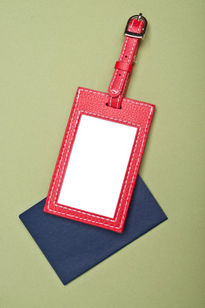 Vibrant Luggage Tag with Generic Passport on a Green Background.  Holiday Travel Concept.