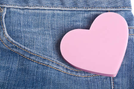Heart in the Pocket of Denim Blue Jean Pants Concept.の写真素材