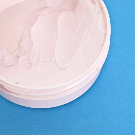 Pink Vitamin E Lotion on a Vibrant Background.  Everyday Object Close Up.の写真素材
