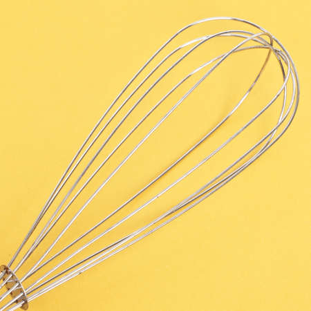 Whisk on a Vibrant Backgroundの写真素材