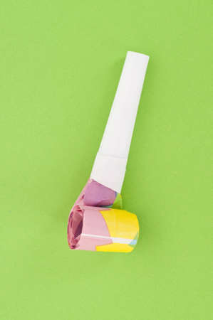 Party Noise Maker on a Vibrant Colorful Background.の写真素材