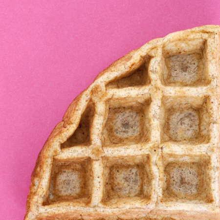 Waffle Close Up Food Concept on Vibrant Pink.の写真素材