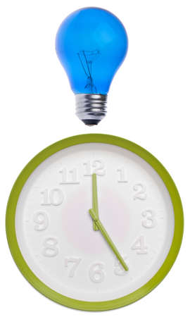 Time and Ideas Concept Image with Light Bulb and Modern Green Clock Isolated on White.の写真素材