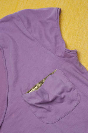Tee Shirt Pocket with Gold Interior Clothing Image.の写真素材