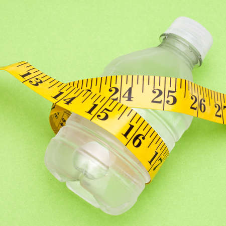 Water Bottle and Measuring Tape Health and Fitness Concept.の写真素材