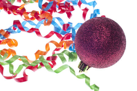 Holiday Party Concept with Streamers and Red Bauble Ornament.の写真素材