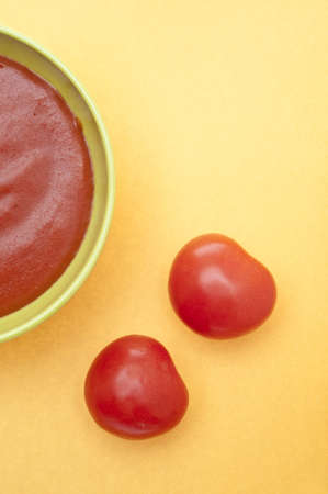 Whimsical Tomato Soup Image with Fresh Tomatoes.の写真素材