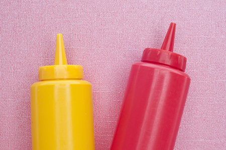 Mustard and Ketchup Make a Great Pair Love Concept on Pink.