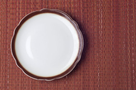Empty Place Setting with Brown Neutral Colors.の写真素材