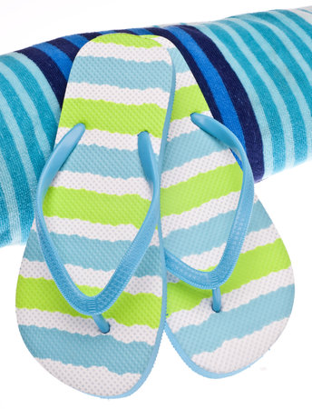 Summer at the Beach Concept with Towel and Flip Flop Sandals.の写真素材