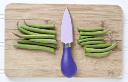 Sliced Green String Beans with Vibrant Knife Cooking Concept.の写真素材