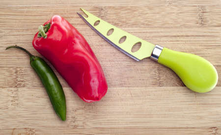 Sweet and Spicy Peppers on Wooden Background.の写真素材