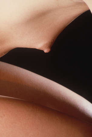 woman's breast side view kneeling positionの写真素材