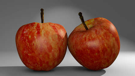 Two red apples on a seamless background close-upの写真素材