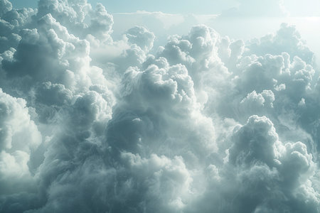 Aerial view of beautiful white fluffy clouds floating in the blue skyの素材