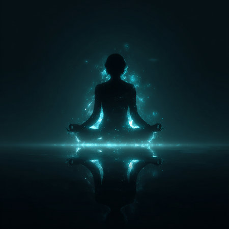 Woman meditating in lotus pose with light effect on the backgroundの素材