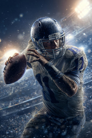 American football player in action with ball on stadium background. Mixed mediaの素材