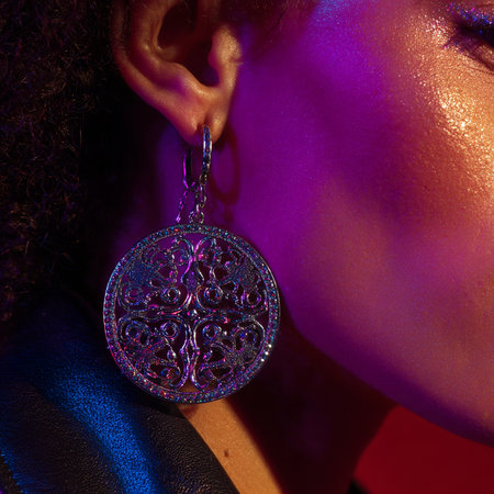 Close-up portrait of a beautiful African American woman with luxury jewelry.の素材