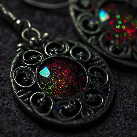 Jewelry pendant on a dark background close-up.の素材