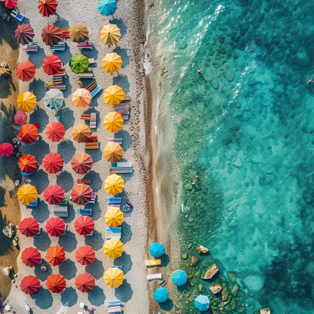 Aerial view of beach with sunbeds and umbrellas.の素材