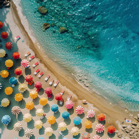 Aerial view of beautiful beach with sunbeds and umbrellasの素材