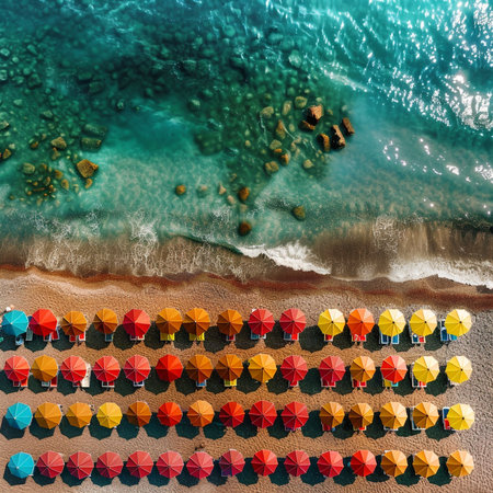 Aerial view of beach umbrellas and sunbeds on the beachの素材