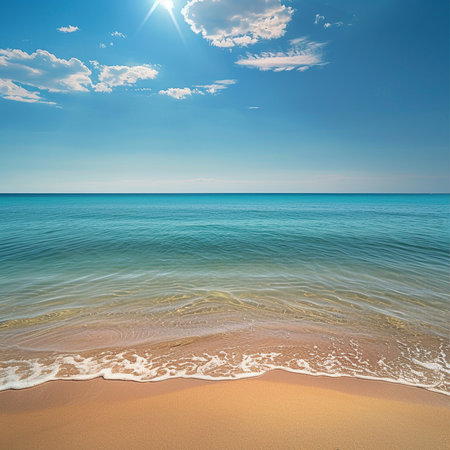 Beautiful seascape. Sandy beach and blue sky with cloudsの素材