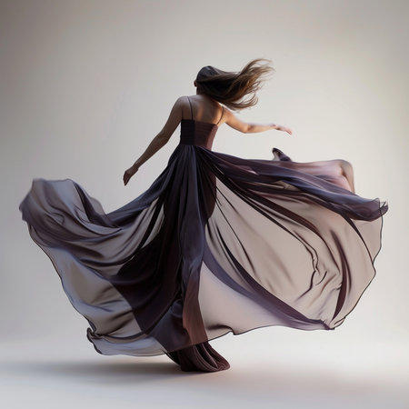 Beautiful young woman dancing flamenco dance. Studio shot.の素材
