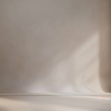 Empty room with white wall and light coming from the window. Abstract background.の素材