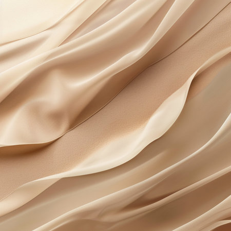 Closeup of rippled beige silk fabric texture background.の素材