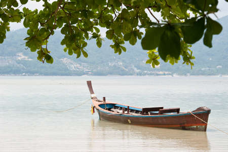 Boats on a Thai beachの写真素材